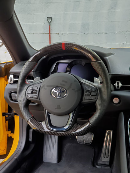 Racing Art [20+ A90 Supra MKV] Carbon Fiber Steering Wheel | Multiple Options Available