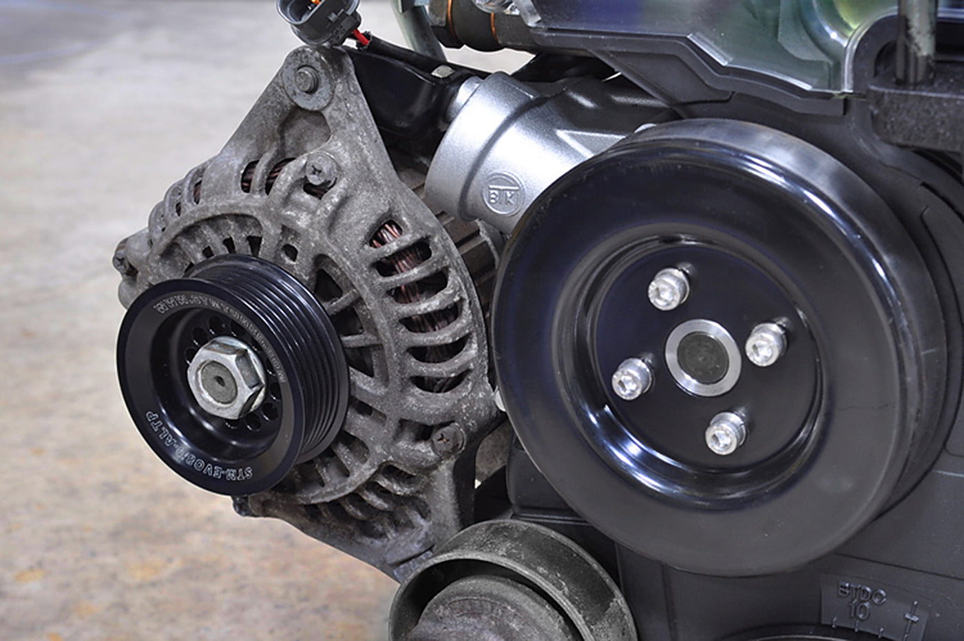 STM Under-Driven Alternator Pulley with Raised Guides for Evo 4-9 *Backorder ETA 02/2026*