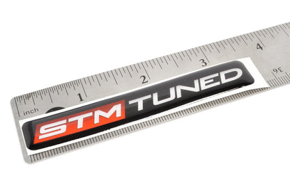 STM Tuned Badge
